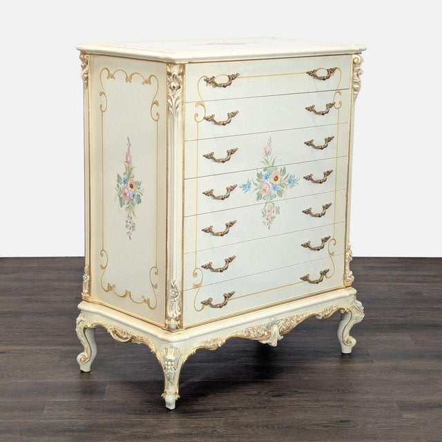 This elegant dresser features a classic Rococo style with ornate carvings and gold accents. The front is beautifully hand...