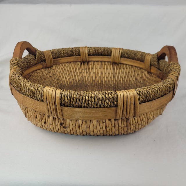 Late 20th Century Vintage Round Woven Wicker Rice Basket With Wood Handles Rustic Boho For Sale - Image 5 of 11