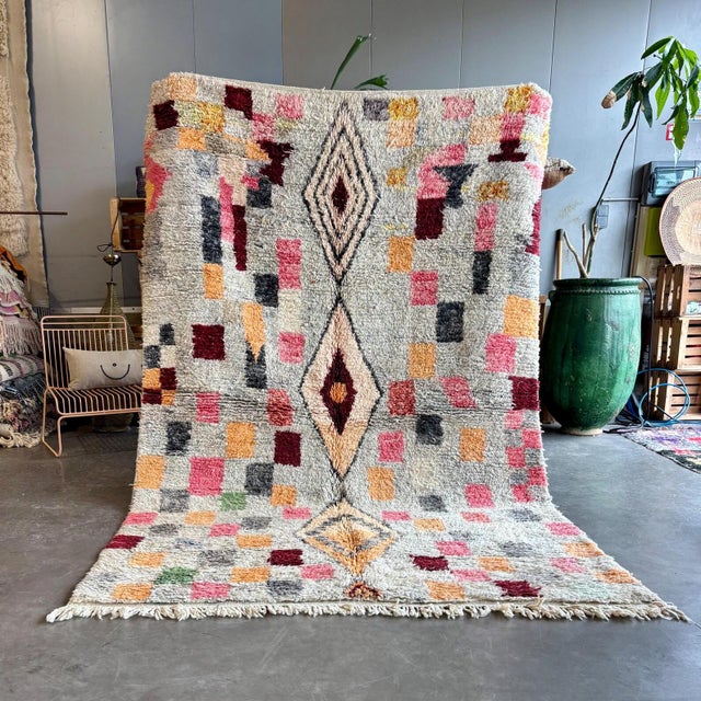 Add soul and color to your space with this authentic Moroccan Boujad rug, handmade by Berber artisans in the Middle Atlas...