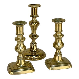 Set of Three 18th Century Hand-Made Brass Candlesticks For Sale