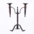 Standout pair of 19th century French hand wrought iron candle sticks each with two candle holders attached to a twisted...