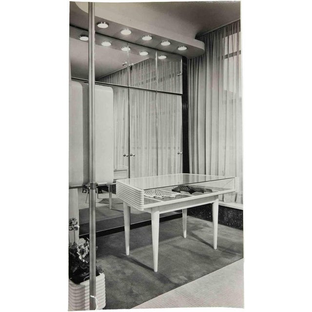 Vintage black and white photograph showing the interior of a fashion salon, most probably the NK Department Store...