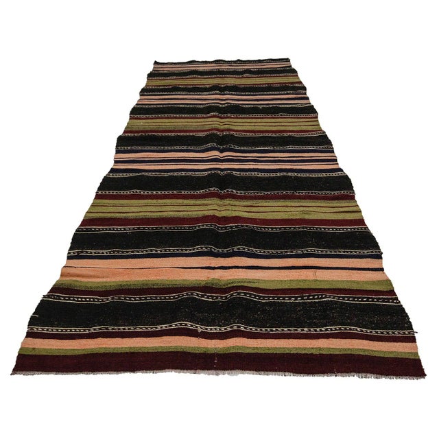 Vintage handwoven kilim rug from Denizli region of Turkey. Approximately 50-60 years old. In very good condition.