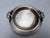 A single vintage round silver plated bowl or dish featuring chaine d'ancre handles. Interior base measures 6". Marked...