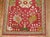 A colorful Turkish Oushak throw rug. Predominantly bright reds and greens, circa 1930. Measures: 3'3'' x 5'.