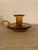 This is a beautiful candelabra with holder in amber glass, signed.