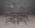 Set of Four French Iron Curule Side Chairs With Woven Strap Seats For Sale - Image 4 of 12