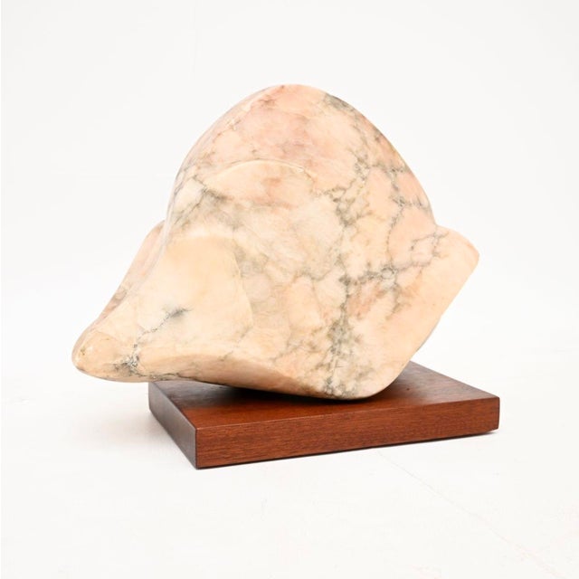 A wonderful pair of vintage marble sculptures by a. Altmann. They were made in london, england; and date from the 1960’s....