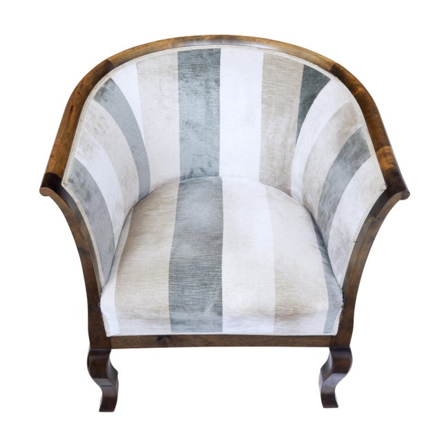 A pair of Scandinavian Midcentury birch wood club armchairs circa 1950 with horseshoe backs. Introduce a touch of...