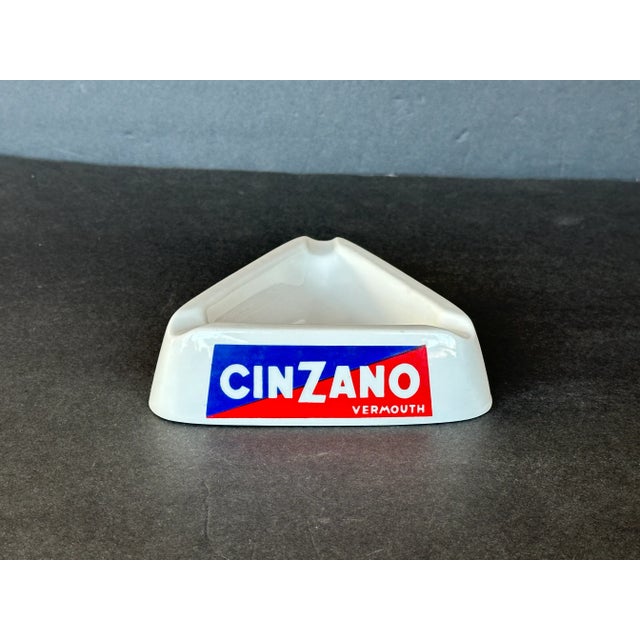 Display this vintage CinZano Vermouth ashtray on a bar cart or use it as a unique catchall on a your home office desk....
