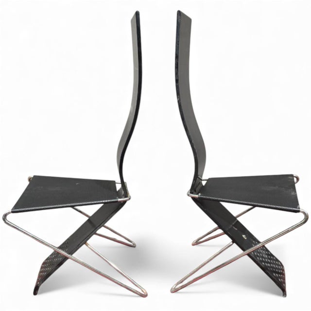 A pair of chairs from the Impronta series, designed by artist Pietro Arosio in 1986. The chairs feature a distinctive...