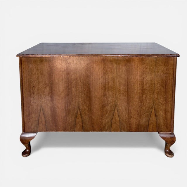 A classic vintage walnut blanket box by Sutcliffe of Todmorden, combining practical storage with traditional...