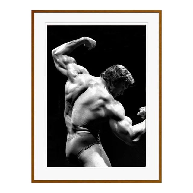 Arnold Schwarzenegger Flexing Brown Framed Archival Pigment Print For Sale