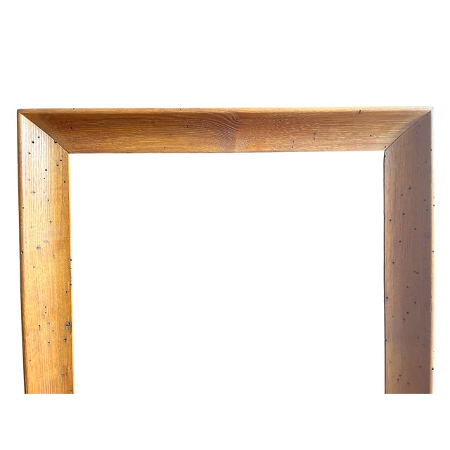 This early 20th century solid oak picture frame with natural wormwood effect features clean mitered corners, generous cove...