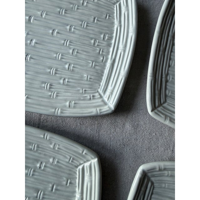 A striking set of six vintage rectangular appetizer plates in a bamboo majolica style, made in Italy. These plates feature...