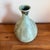 This vintage California studio pottery vase has a beautiful, understated presence. The form is simple and elegant, with a...