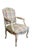 Vintage French Provincial / Louis XV style arm chair. Made of walnut featuring carved floral and serpentine design with...