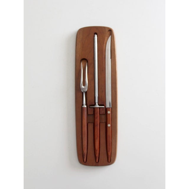 Vintage 1960s Robeson ShurEdge “Frozen Heat” carving set, including knife, fork, and sharpening steel, each with a long...