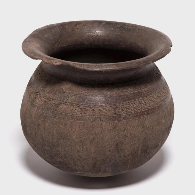 Like other African everyday ceramics, Bamileke storage pots are revered for their simple forms yet astonishing beauty....