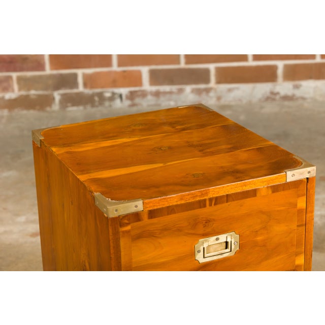 A small English 19th century Campaign chest by Bissitt & Brunton LTD, with two drawers, brass hardware and bracket feet....