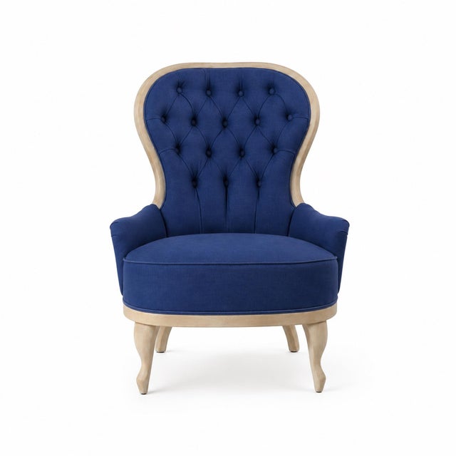 This antique English armchair newly upholstered in rich ink Ralph Lauren glazed linen. The sculptural high back features...