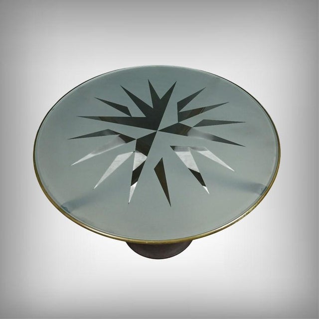 Astrolabio Table by Oscar Tusquets, 1988, in Very Good conditions. Designed 1980 to 1989 This piece has an attribution...