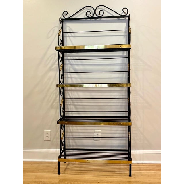 Vintage French Style Four Tier Scrolled Wrought Iron & Brass Baker's Rack Preowned and in good condition. The brass does...
