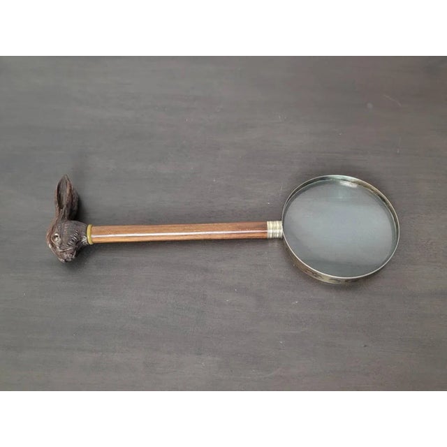 A charming fine quality antique English magnifying glass, dating to the early 20th century, custom made from earlier...