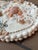 Coastal luxury circular shell wall panel on antique white background. Measures 12.5”. Will come signed, dated and ready to...