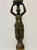 Elegant neoclassical Greco-Roman style sculpture of a classical female figure standing on a globe and holding up a basket...