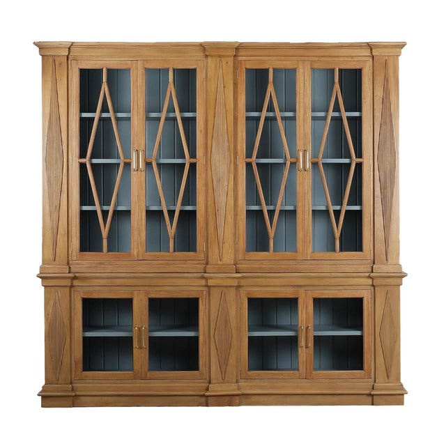 In Antique French Oak finish, this monumental cabinet features diamond-patterned fluted detailing, crown moulding, and...