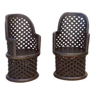 Set of Two Finely Carved African Bamileke Club Chairs For Sale