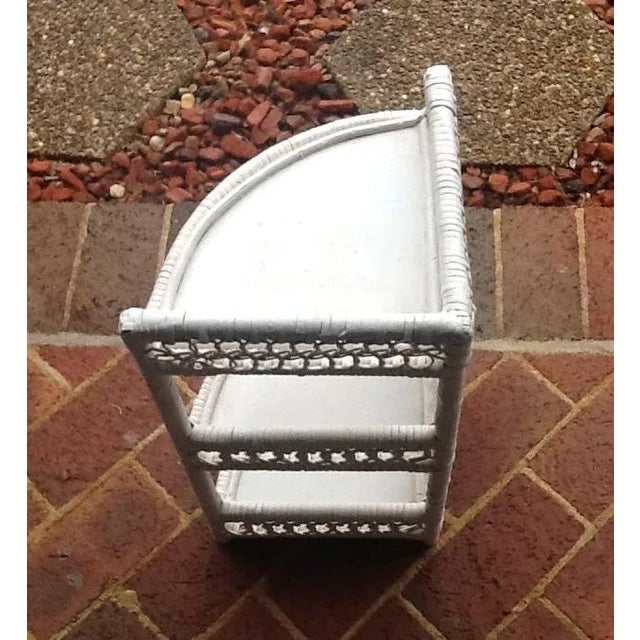 What’s not to love about the look of this triple-tiered white wicker storage unit? It is the perfect Mid-Century piece to...