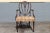 A single c1950's heavily and masterfully carved Sheraton style Arm Chair/ Occasional Chair. Textile is original and in...