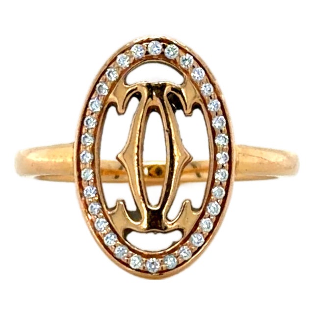 Cartier 18k Rose Gold Ring With Logo Double C Motif and Diamond Halo, Size 5.25 For Sale