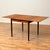 The dining table was made in Denmark in the 1950s-60s. It is made of teak veneer on the top and in solid teak wood in the...