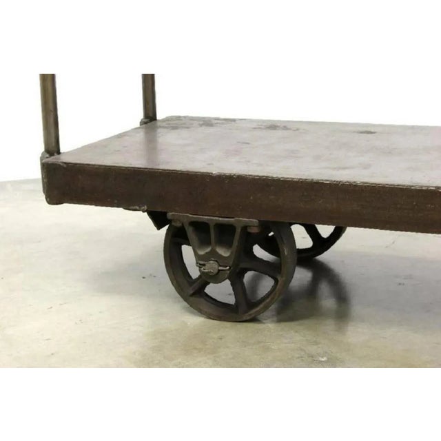 Large triple shelf for clothing storage or store display. Made from iron and reclaimed wood. Measure: Height 78 inches,...