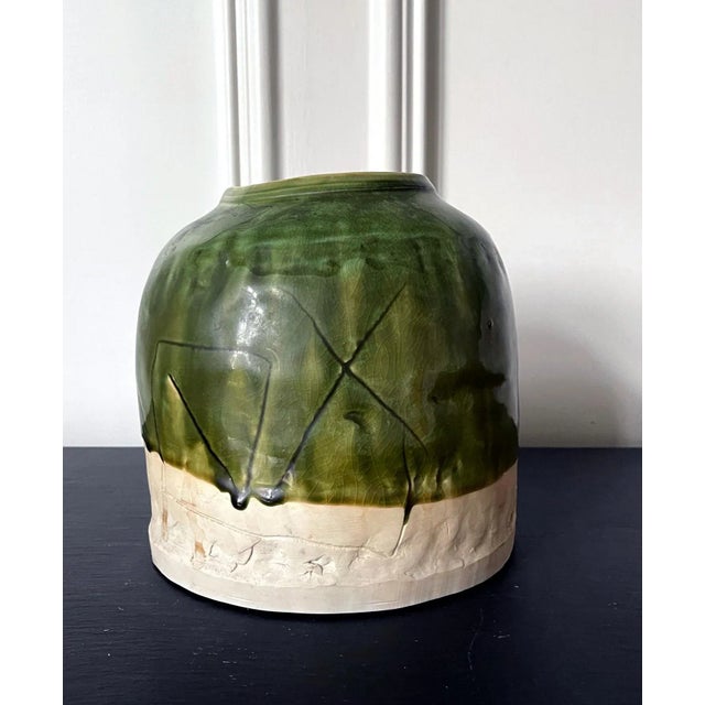 A glazed ceramic vessel by Japanese potter Ryoji Koie (1938-2020). Hand-built with intention to be seen as such, the tsubo...