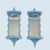 Charming pair of vintage chinoiserie pagoda-shaped wall shelves in light blue painted wood. Each features a rectangular...
