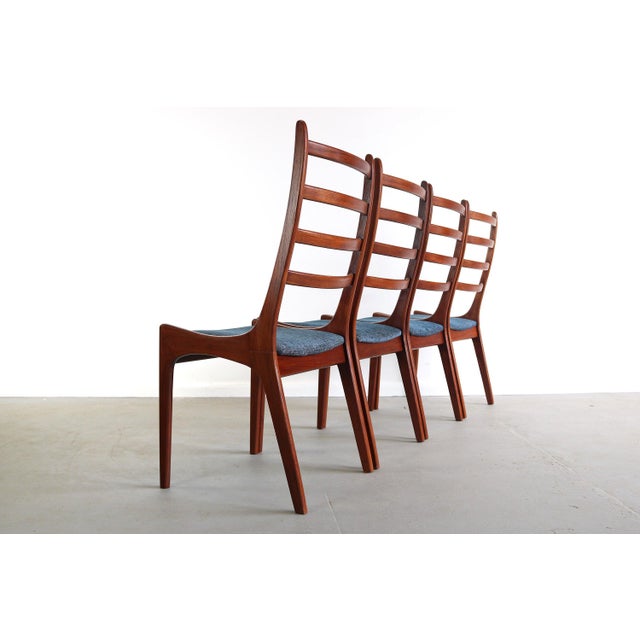Set of 6 Mid Century Danish Modern Contoured Ladder Back Dining Chairs in Teak by Kai Kristensen These gorgeous chairs...