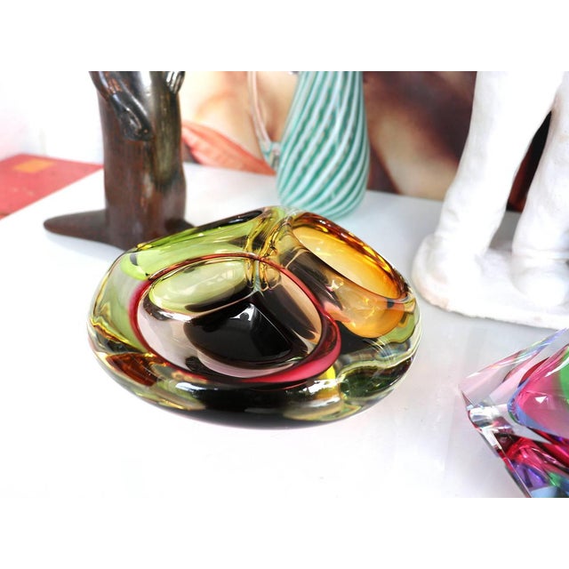 A biomorphic thick glass bowl with three sections made in Murano, Venice Italy in the 1960s.