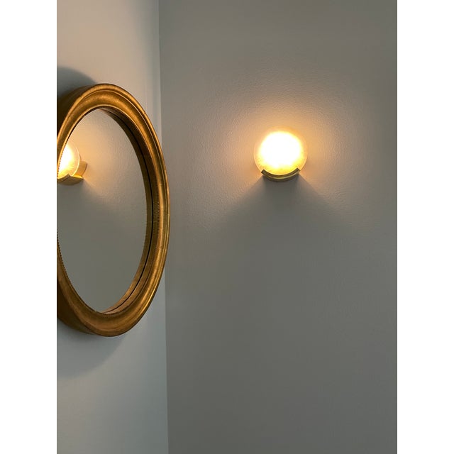 One pair of Kelly Wearstler Melange sconces made for Visual Comfort. Like new alabaster and brass round sconces used...