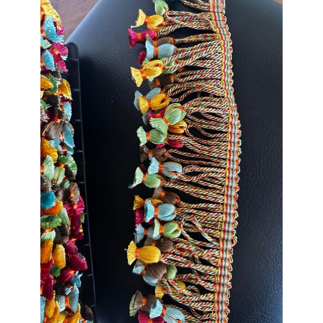Authentic Kenneth Meyer tassel fringe trim in a rich multicolor palette featuring aqua, olive, berry, gold, and chocolate...