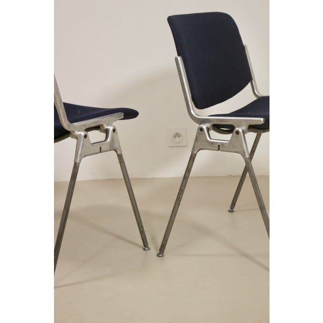 Pair of chairs from 1960s by Giancarlo Piretti for the Italian firm Castelli Steel Structure Seat and restored back and...