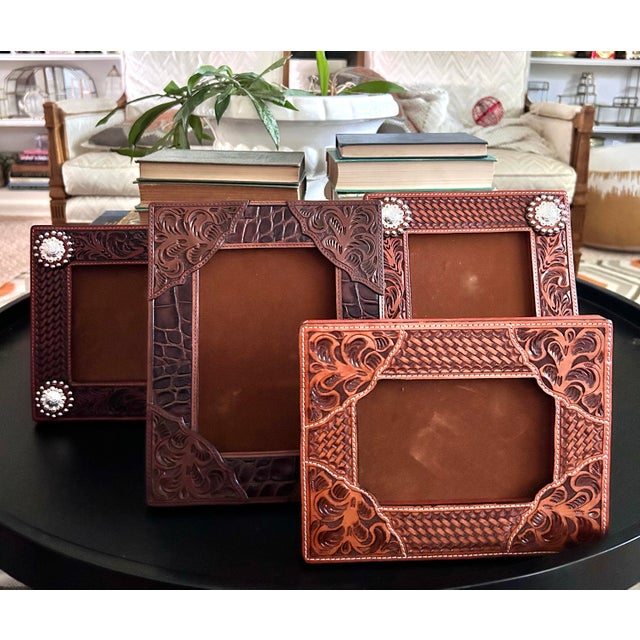 Handcrafted genuine leather picture frame featuring classic Southwestern styling with richly detailed floral tooling,...