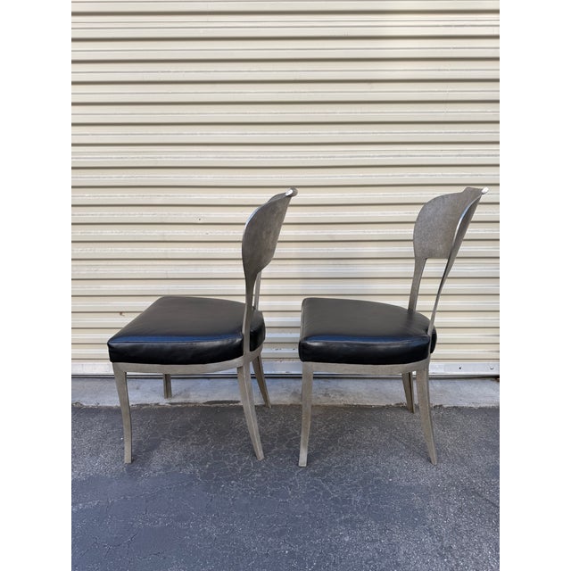 Striking pair of Oly Studio Beverly dining side chairs, showcasing the brand’s signature blend of sculptural elegance and...