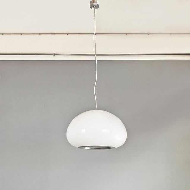 Black and white model chandelier, with rounded diffuser, in opaline glass, containing two e27 connections. The lower part...