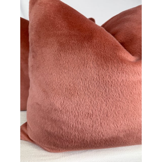 Custom pair of 22" pillows covered in Holly Hunt "Royal Alpaca" in color morganite. These pillows have tapered corners to...