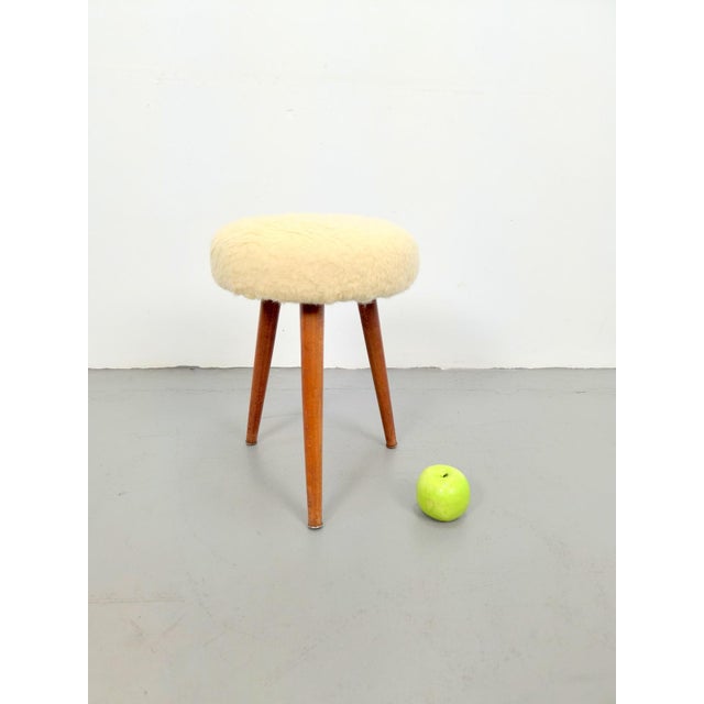 Vintage Swedish Three Legged Sheepskin Stool, 1970, in Flawless conditions. Designed 1970 to 1979