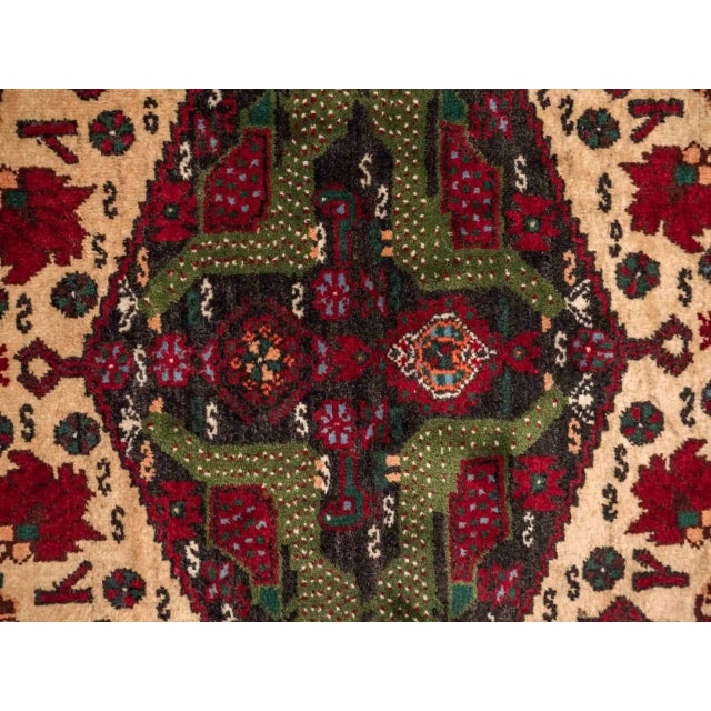 Hand-knotted wool rug on cotton warp. Beautiful bird rug motif dominated by peacocks in the center of the rug. There are...
